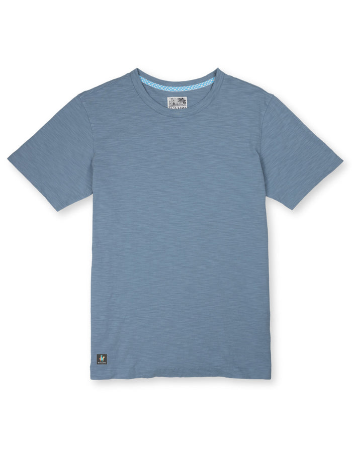 Front flat lay of slate blue Solid Slub Pima tee with blue checkered neck tape