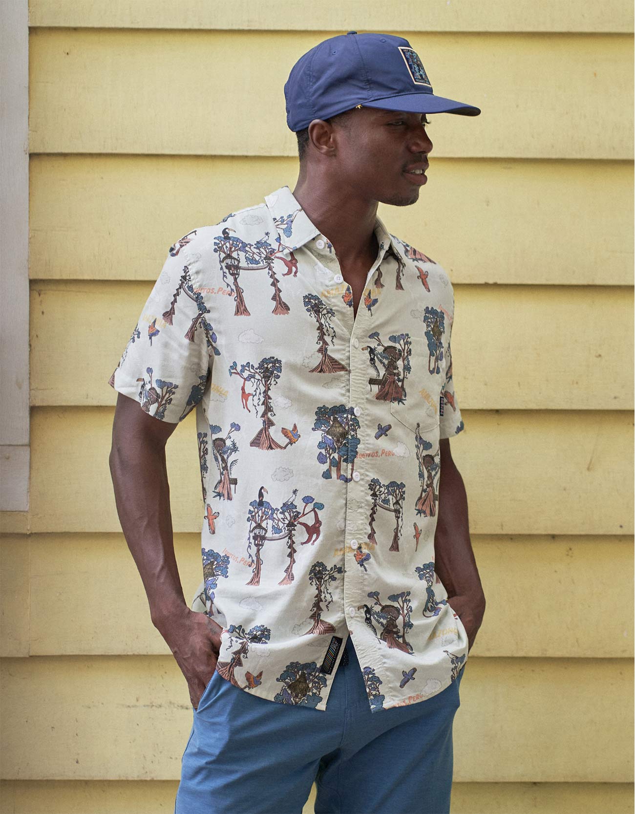 Amazon rainforest treehouse print shirt depicting canopy life in Peru's jungle