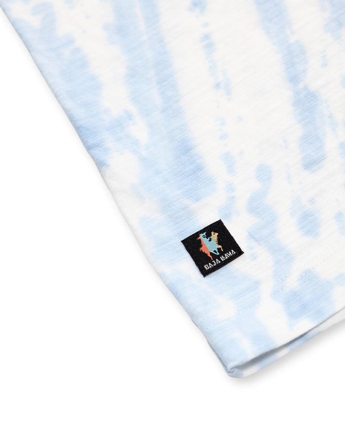 Hem llama tag close-up on light blue white Tie Dye Slub Pima tee