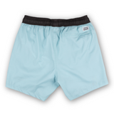 Men’s light blue swim shorts with retro-style orange and white side stripes, black elastic waistband, and adjustable drawstring. Features embroidered Baja Llama scorpion design and quick-dry fabric for all-day comfort.