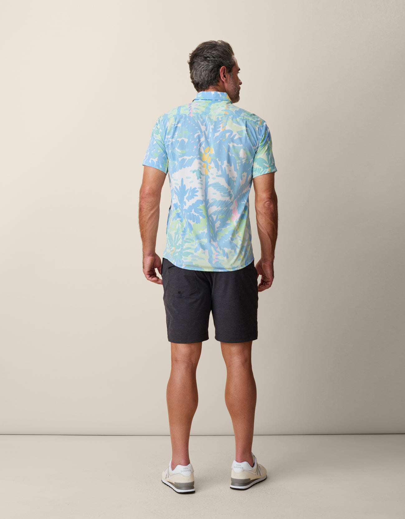 Back view of ultralight pastel print shirt – perfect for travel and beach days
