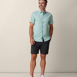 Lightweight travel shirt in sage green with tailored fit