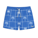 Blue swim shorts with white palm tree pattern on a white background