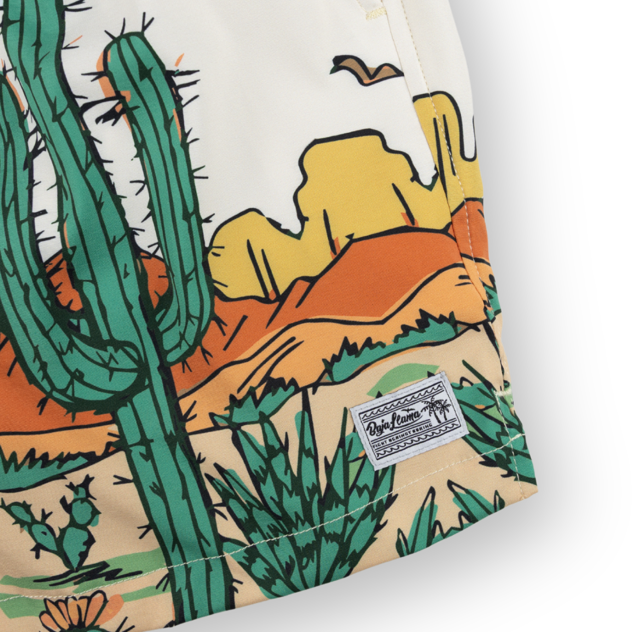 Desert-themed swim shorts with a bold cactus landscape print and a comfortable elastic waistband. Adventure-ready and quick-drying for all-day wear.