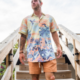Model wearing Time Before Land Vagabond button-up shirt in tropical landscape