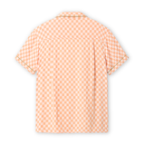 Orange checkered shirt on a light background with green piping back lay down