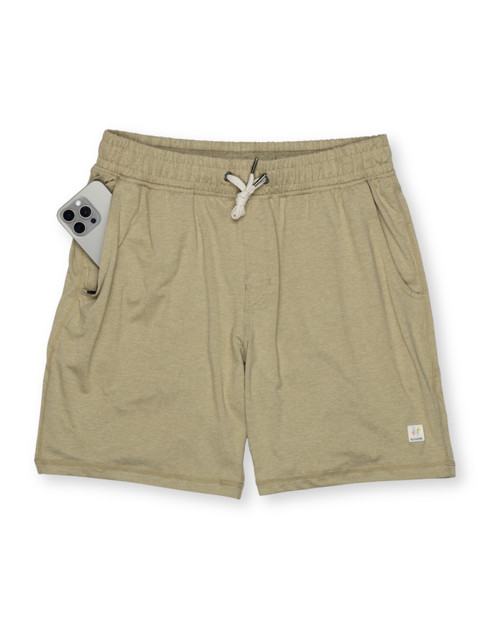 Baja Llama Mach Zero Lounge Shorts in Natural Earth, featuring a smartphone sliding into the right side-zipper pocket to demonstrate pocket depth and functionality.