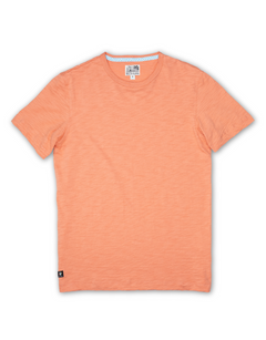 Baja Llama Solid Burnt Salmon Slub Pima Tee – Burnt coral crewneck T-shirt made from ultra-premium Peruvian cotton with textured slub finish – Displayed flat with visible woven neck label and signature Sloth Llama patch near hem – Lightweight, breathable, and eco-friendly casual wear for men