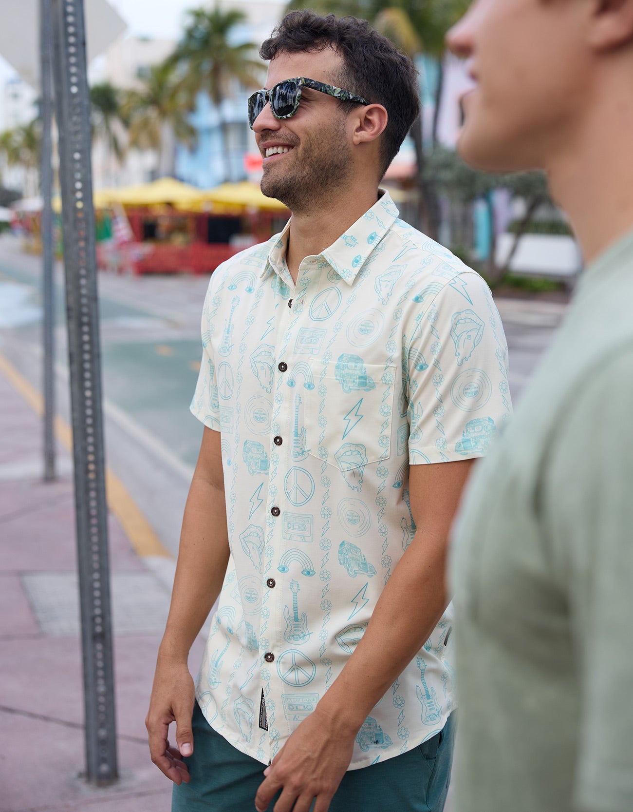 Man wearing the Backstage Pass Vagabond Button Up outdoors