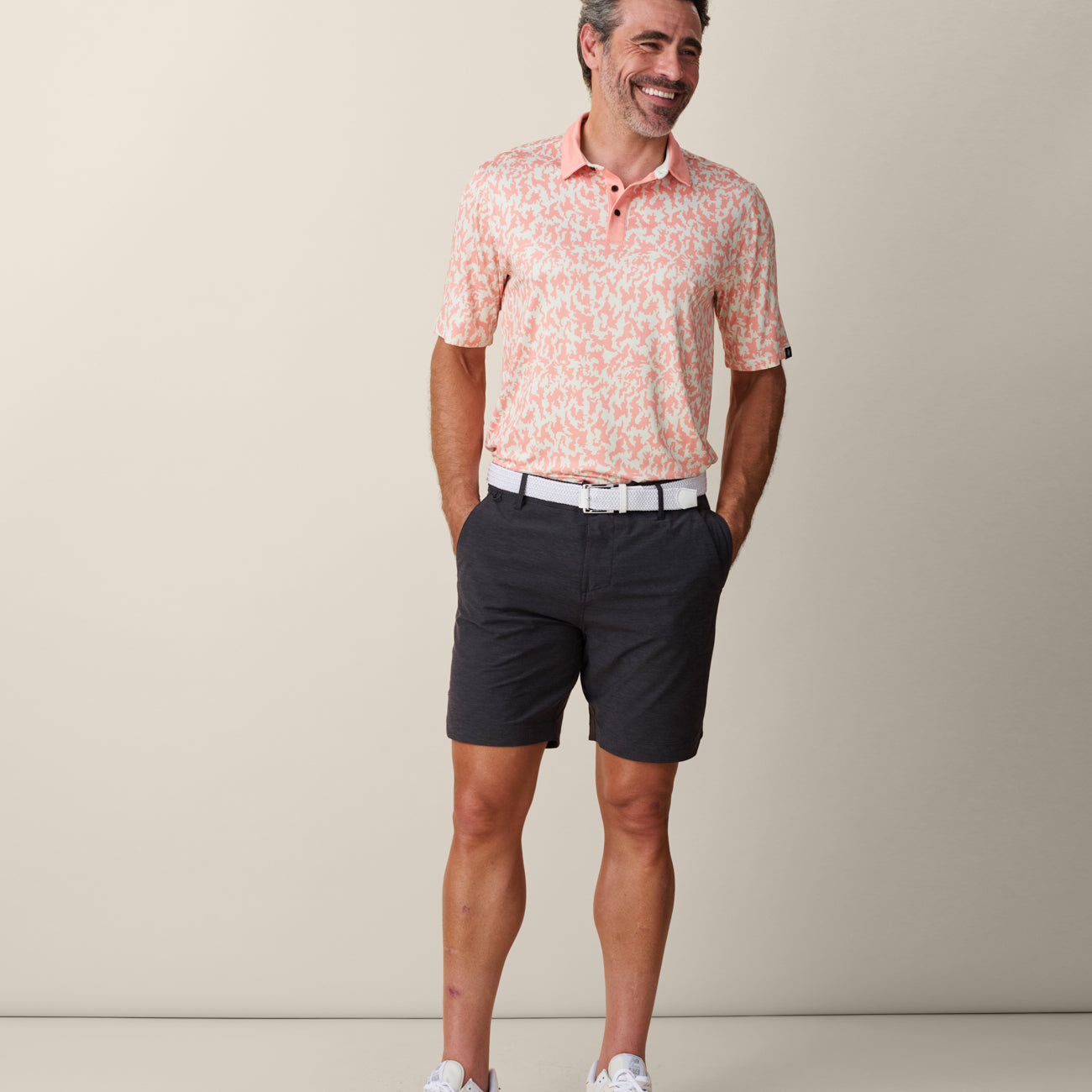 Men’s orange clay performance golf polo
