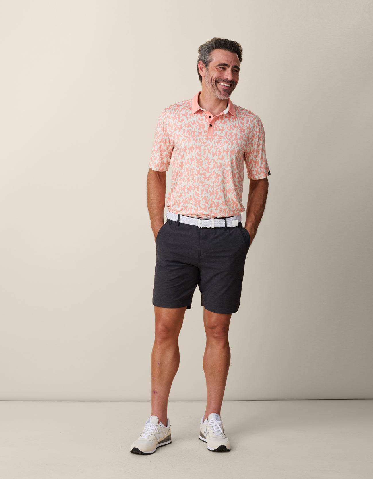 Men’s orange clay performance golf polo
