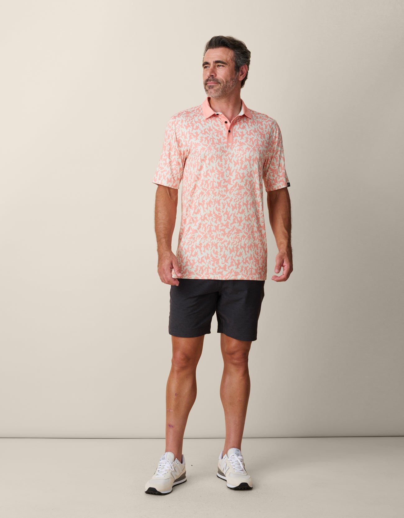 Men’s stylish performance polo for course and travel
