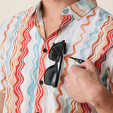 Men’s button up with sunglass holder chest label
