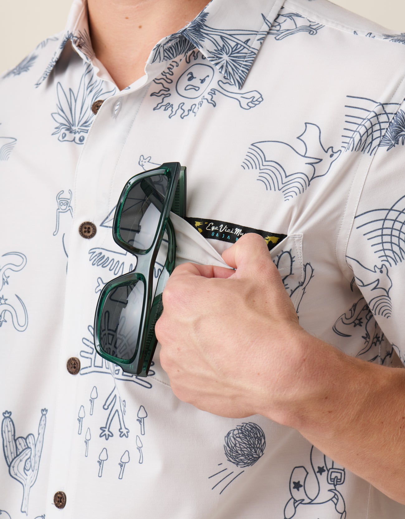 Men’s button up with sunglass holder chest label