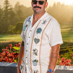 Model wearing Baja Llama El Sativo Tequila Guayabera button up shirt outdoors