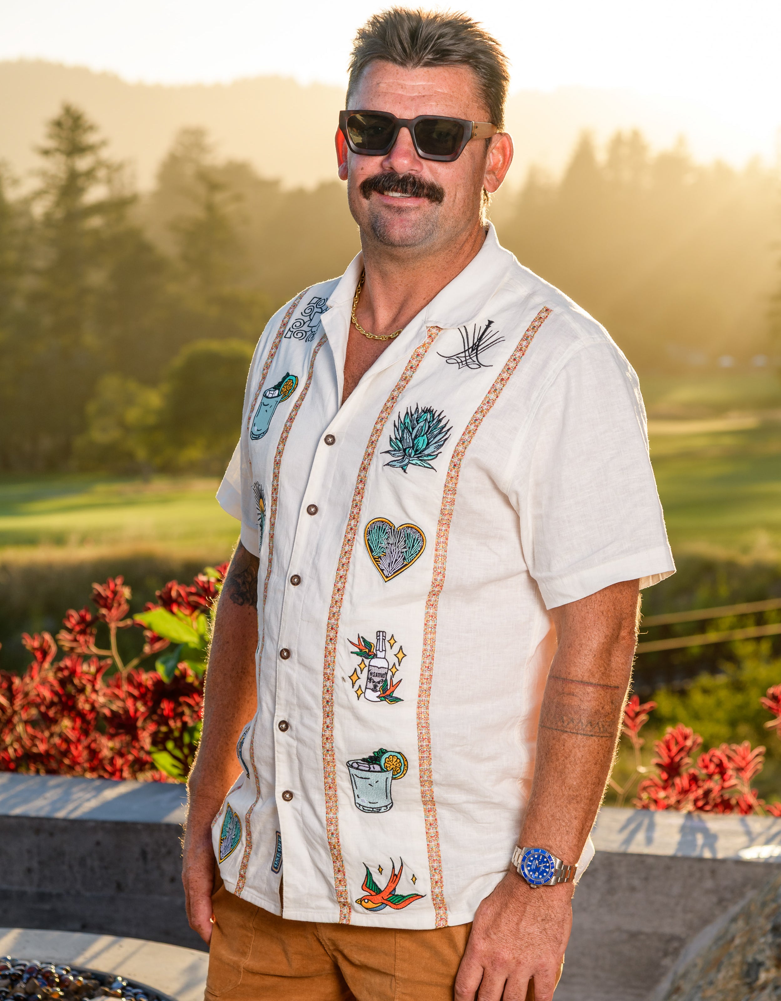 Model wearing Baja Llama El Sativo Tequila Guayabera button up shirt outdoors
