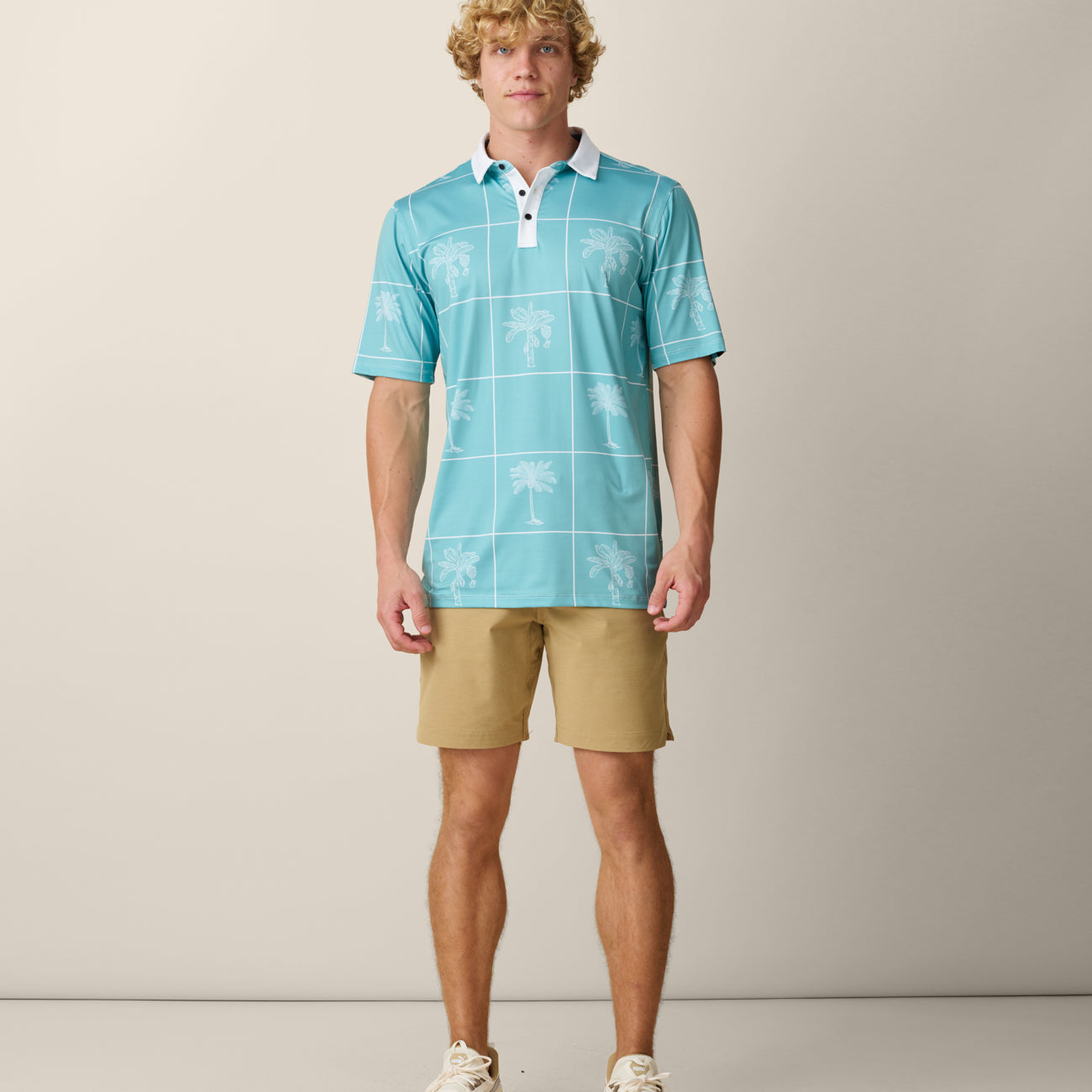 Men’s palm green performance golf polo with white palm tree print