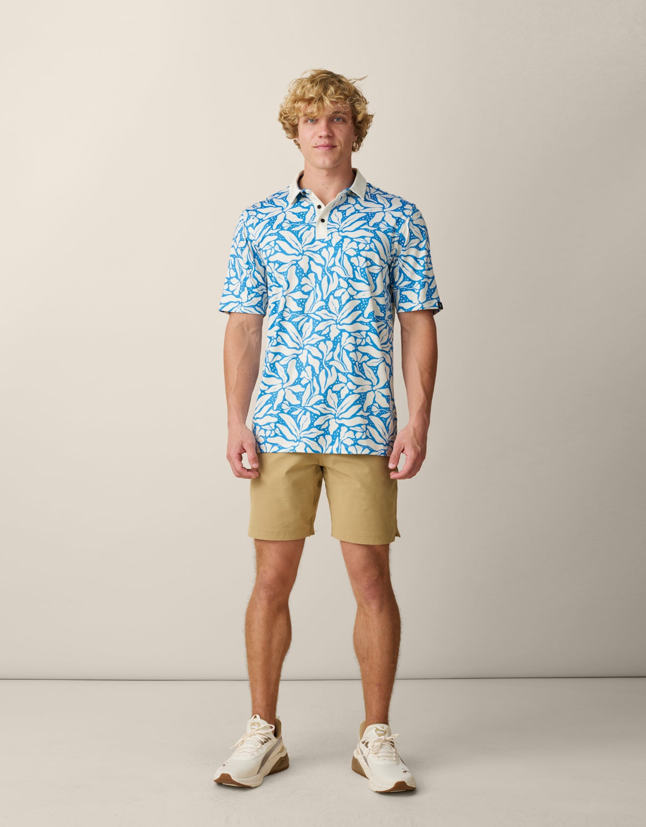 Men’s blue tropical performance golf polo
