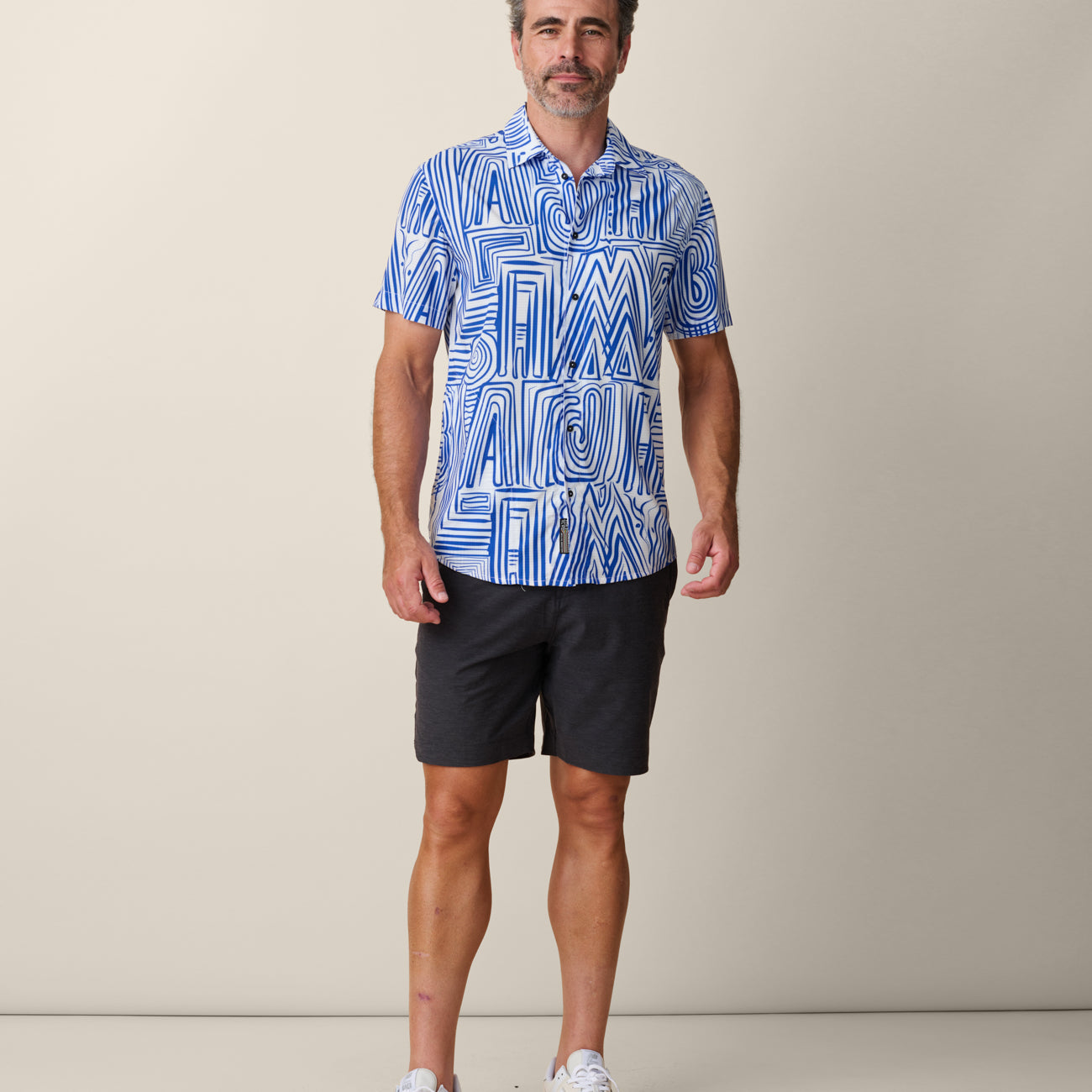 Model wearing Baja Llama Line Work Mojave Perforated Button Up