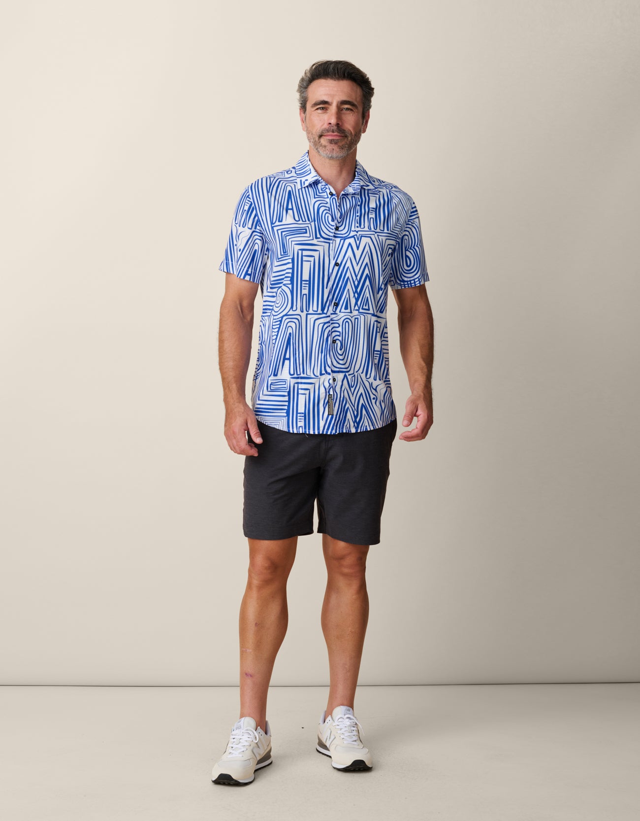 Model wearing Baja Llama Line Work Mojave Perforated Button Up