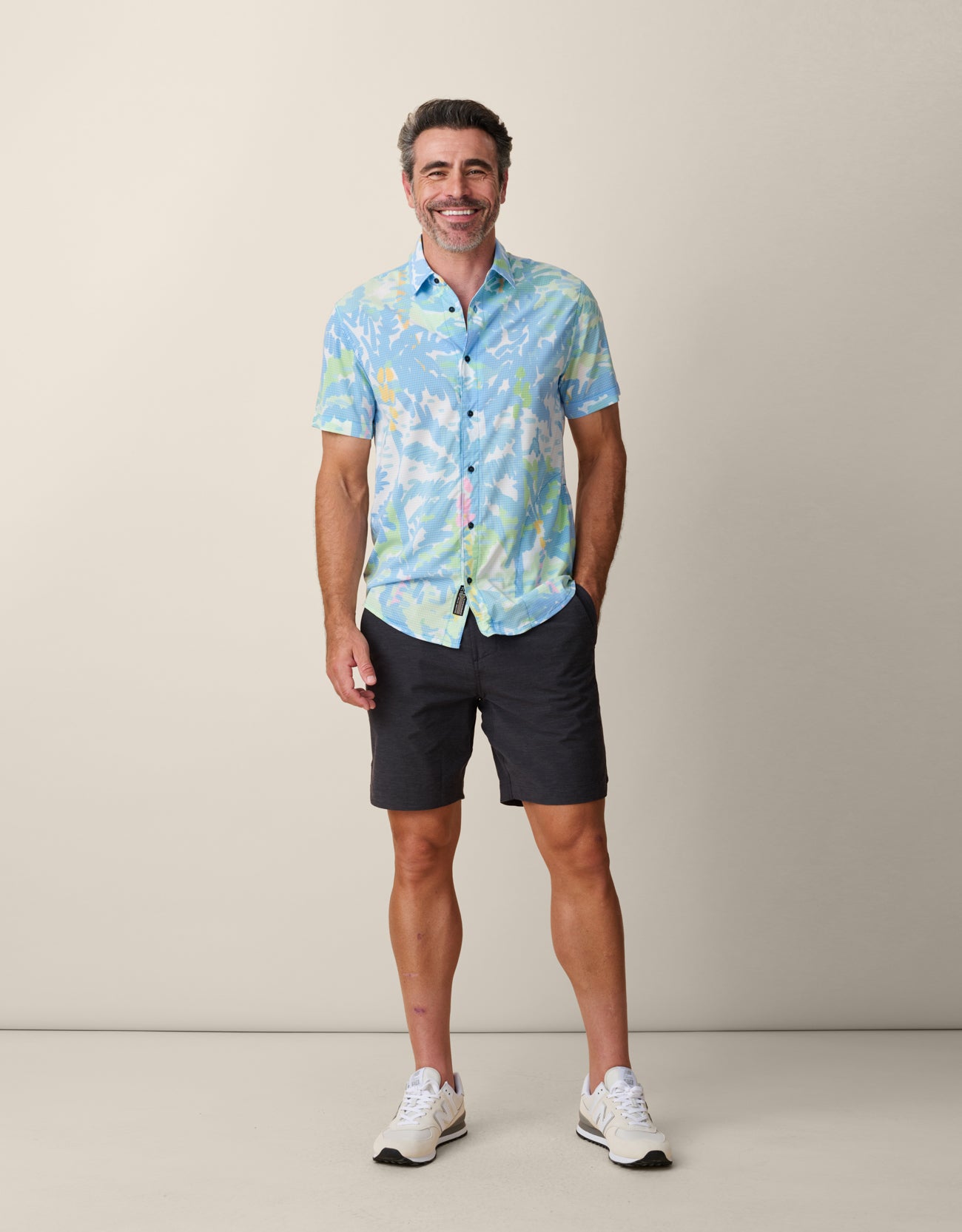 Model wearing Pastel Paradise Mojave Button Up
