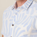 Close-up of fabric and buttons on Purple Leafs Reverse travel shirt