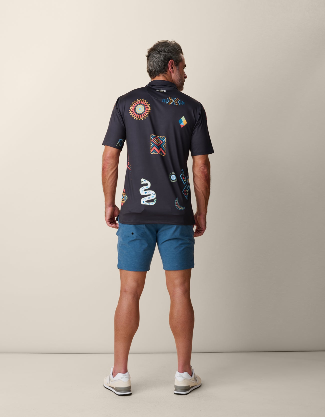 Lightweight stretch golf polo with desert artwork