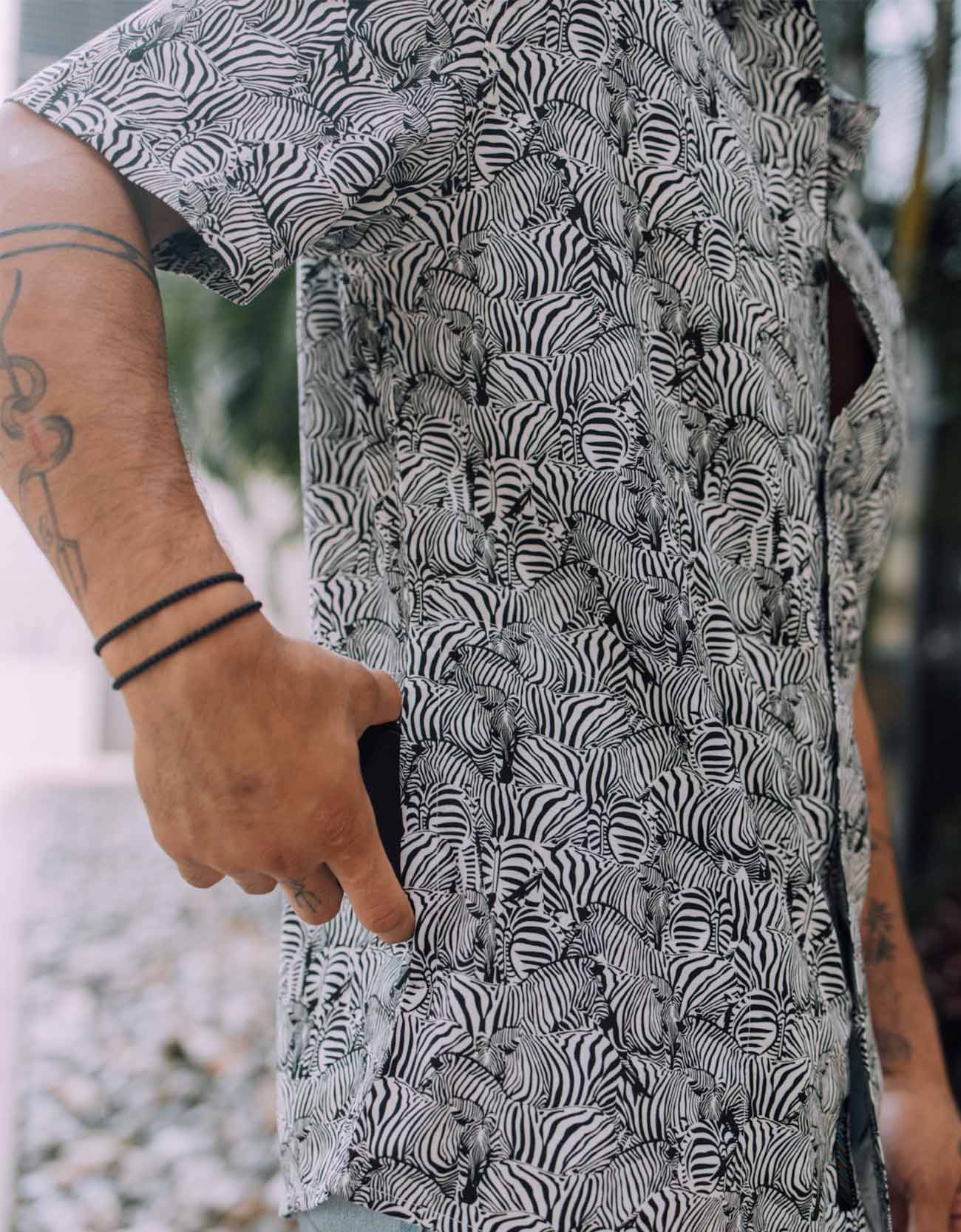 Black button up with subtle zebra stripe print and side pocket