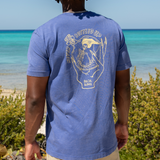 Never Bottled Up graphic tee by Baja Llama. Blue tee featuring a light yellow hand drawn skeleton mermaid. Soft fabric and relaxed fit for adventurous style.