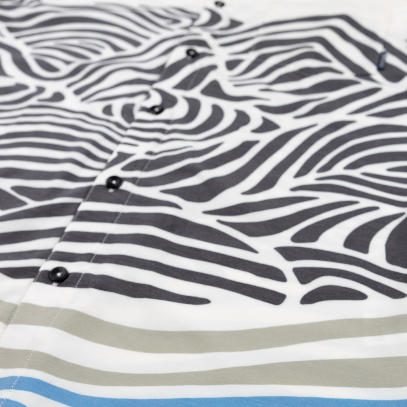 Baja Llama Button-up with Japanese inspired abstract black-and-white landscape and sun graphic. Sleek, bold, and artistic.