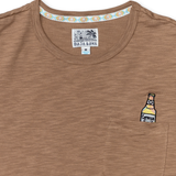 close up shot of the shirt neckline showing the Baja Llama logo and the embroidery on the chest pocket.