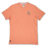 Baja Llama Cactus Hat Slub Pima Pocket Tee in orange, featuring a cactus wearing a cowboy hat embroidered detail peeking out of the front pocket.