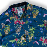 Navy button up with hand drawn pink dolphins, jungle animals and flowers print.