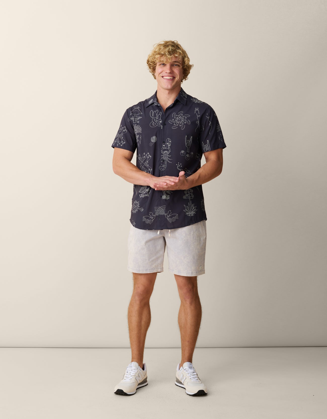 Model wearing Desert Martians Mojave Button-Up – moisture-wicking shirt with alien and desert motif
