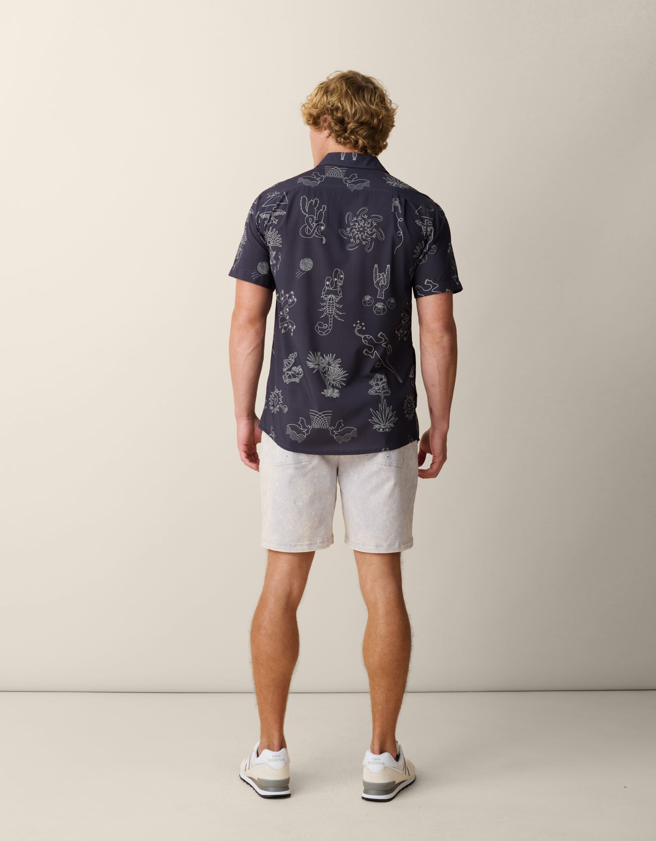Back view of Desert Martians Button-Up – perforated performance shirt for hot weather and travel