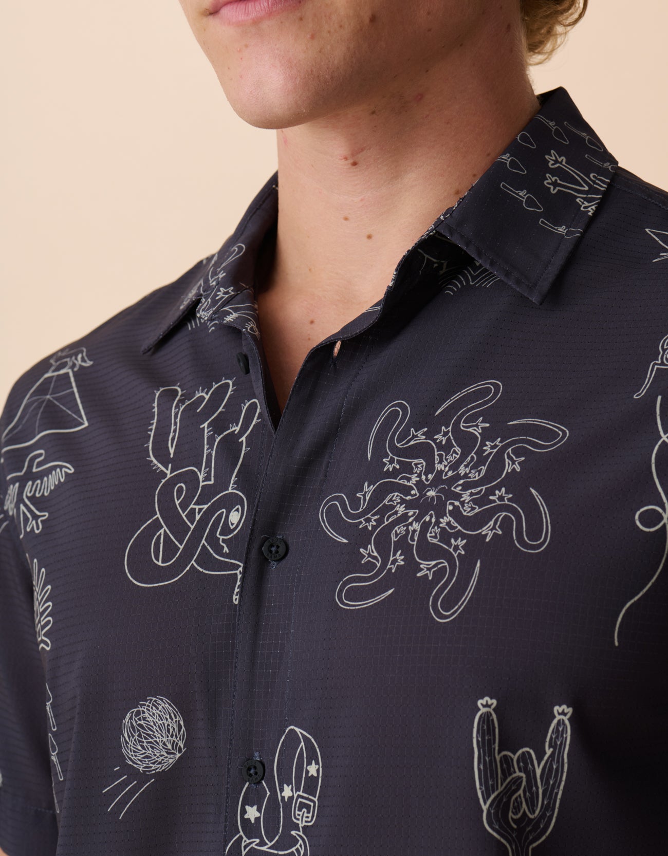 Close-up of Desert Martians print – line-art featuring scorpions, suns, pyramids, and cosmic creatures on an ultralight shirt