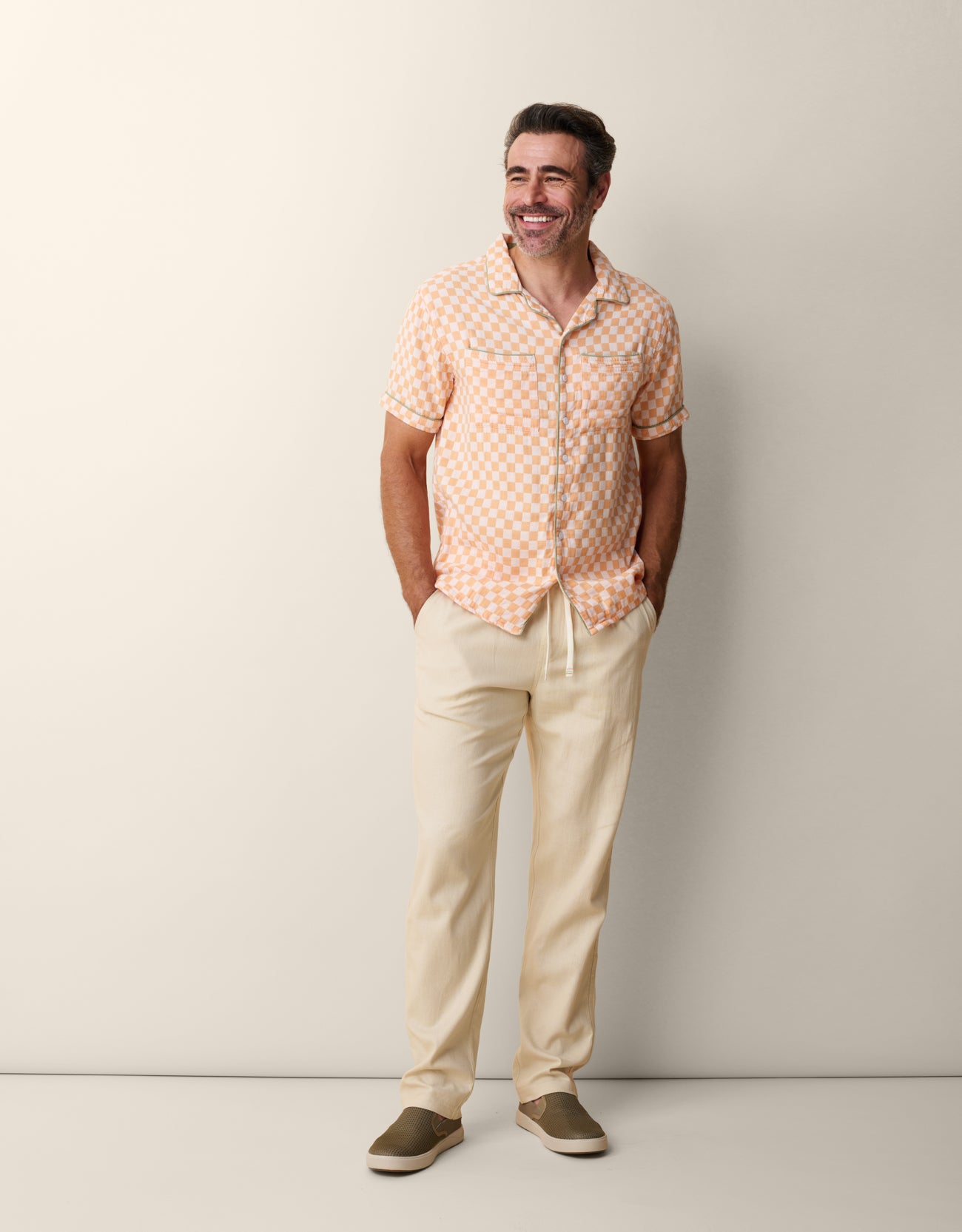Men’s orange checker camp collar shirt with contrast green trim