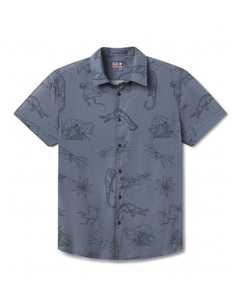 Flat lay of El Manglar Mojave Button Up ultralight travel button-up shirt topographic and wildlife line art
