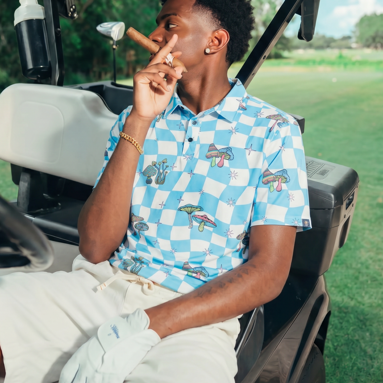golf polo with mushrooms on it