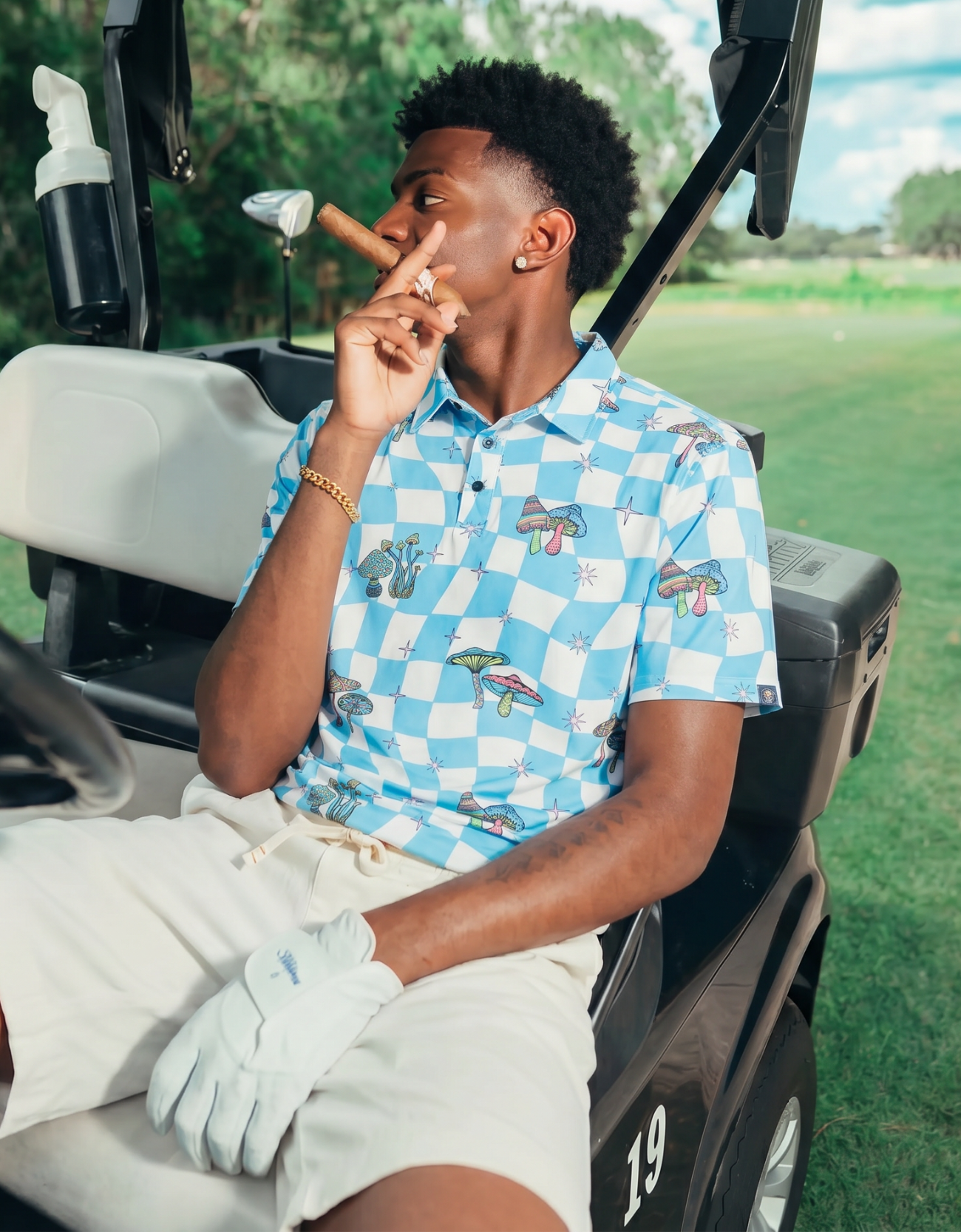golf polo with mushrooms on it