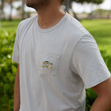 Close-up of a man wearing the Baja Llama Greatful Dyed - Shoreline Smoke Heavy Tee showcasing the chest pocket