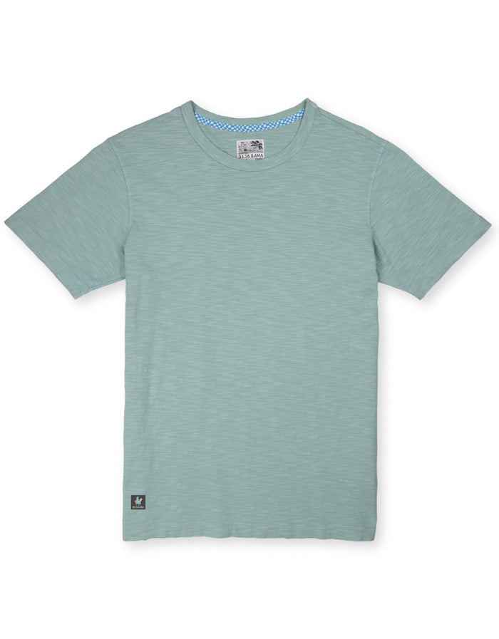 Front flat lay of sage Solid Green Slub Pima tee with blue checkered neck tape
