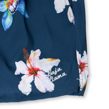 Navy floral swim shorts with a bold hibiscus print and white waistband. Lightweight, quick-dry fabric for a comfortable beach-ready look.