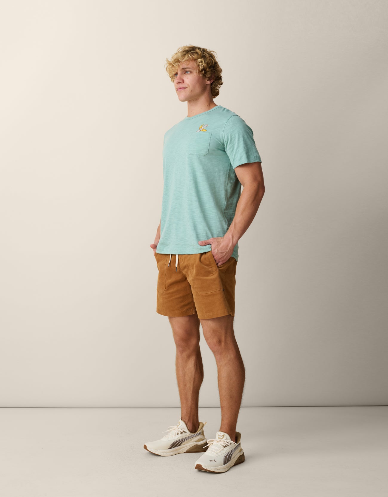 Lightweight Green Pocket Tee with Modern Art-Inspired Embroidery