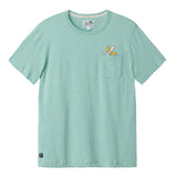 Front flat-lay view of the Baja Llama La Banana Embroidered Pima Slub Pocket Tee, featuring a sage green crewneck t-shirt  with a playful embroidered banana graphic topped with a left chest pocket