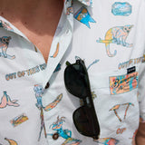 Close-up of Baja Llama La Republica Bananera Icy Mint 7-Seas Relaxed Fit Button Up shirt showing pattern and sunglasses tucked into chest pocket