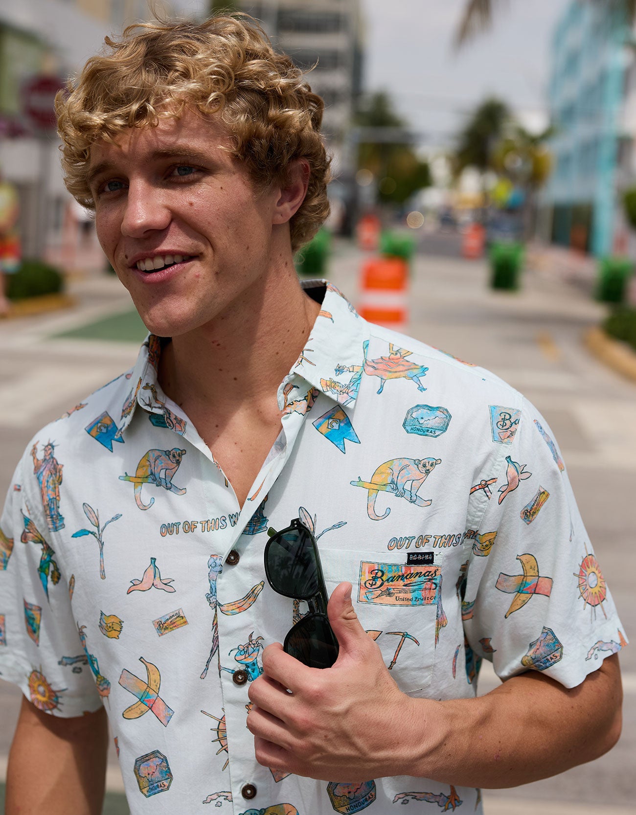 Smiling man wearing Baja Llama La Republica Bananera Icy Mint 7-Seas Relaxed Fit Button Up shirt outdoors