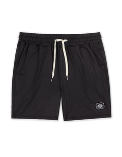 Flat lay of black Mach Zero lounge shorts by Baja Llama featuring a drawstring waist and branded patch.