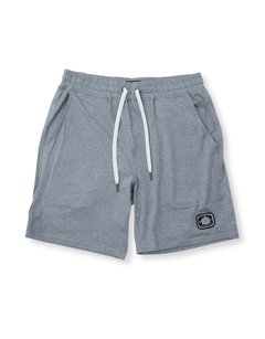 Front view of the Baja Llama Mach Zero Lounge Shorts in gray, featuring an elastic waistband with a white drawstring and a branded patch.