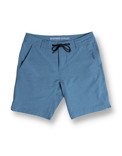 Front view of the Baja Llama Magellan Explorer Shorts in Mallard Blue, featuring a hybrid design with a drawstring waist and side pockets.